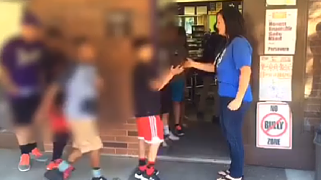 Teacher creates special handshakes to bond with students - KIRO Seattle