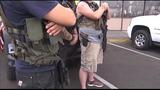 VIDEO: Civilians protecting soldiers inside military recruiting center