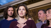 File: Amanda Knox speaks to the media during a brief press conference in front of her parents' home March 27, 2015 in Seattle, Washington.(Photo by Stephen Brashear/Getty Images)